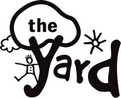 White text of the words "The yard" in front of a childs drawing - the Y looks like a tree with a kid playing on it, and there is an outline of a cloud and the sun in the sky. All in white.